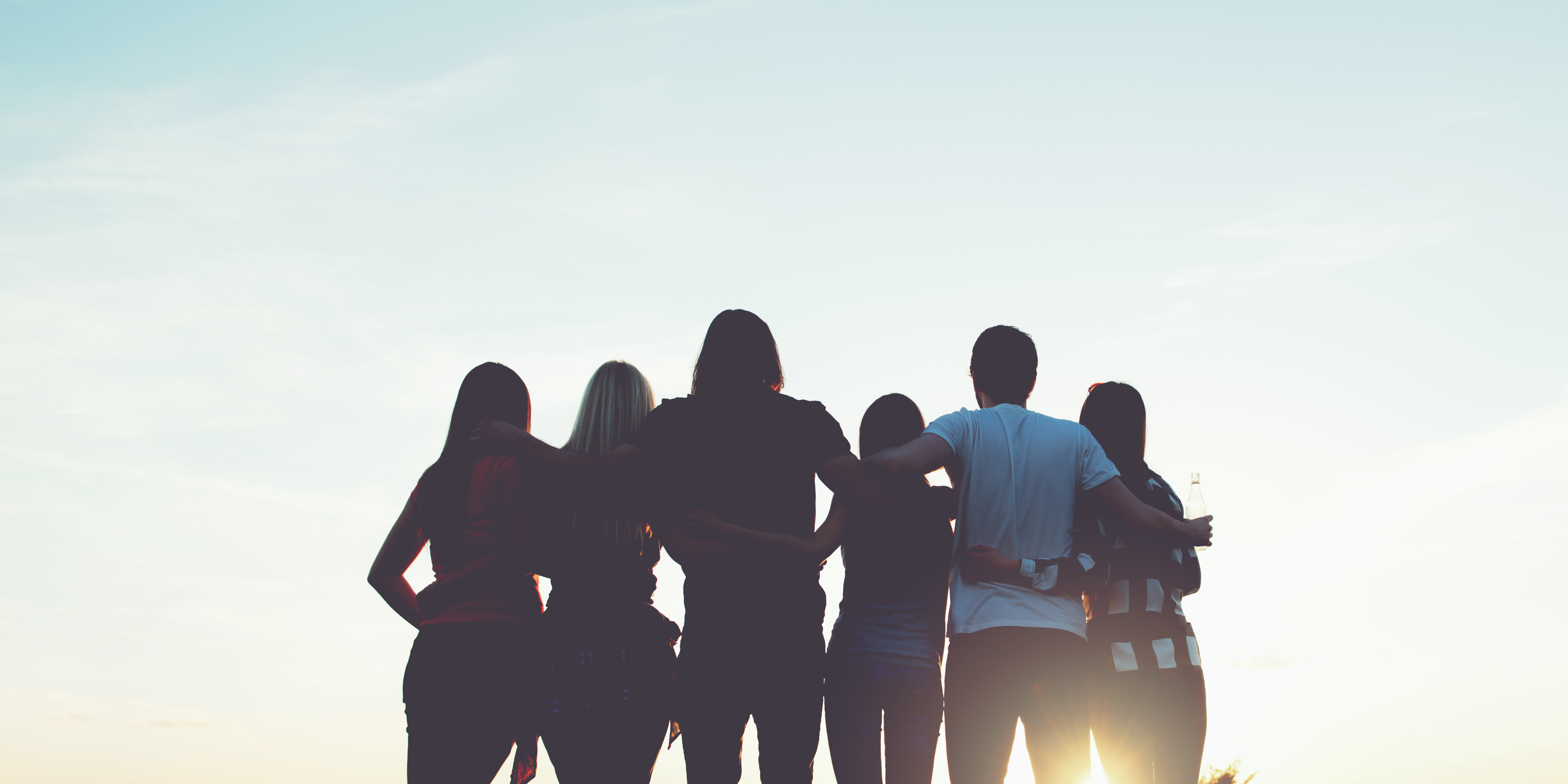 groups hero three men and laughing two women walking side by side